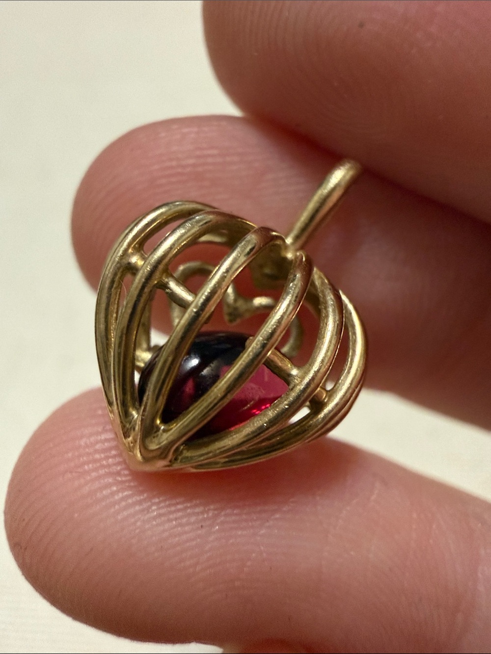 Lovely 10K Gold Heart Cage Pendant with Dark Red Garnet-Style Stone
